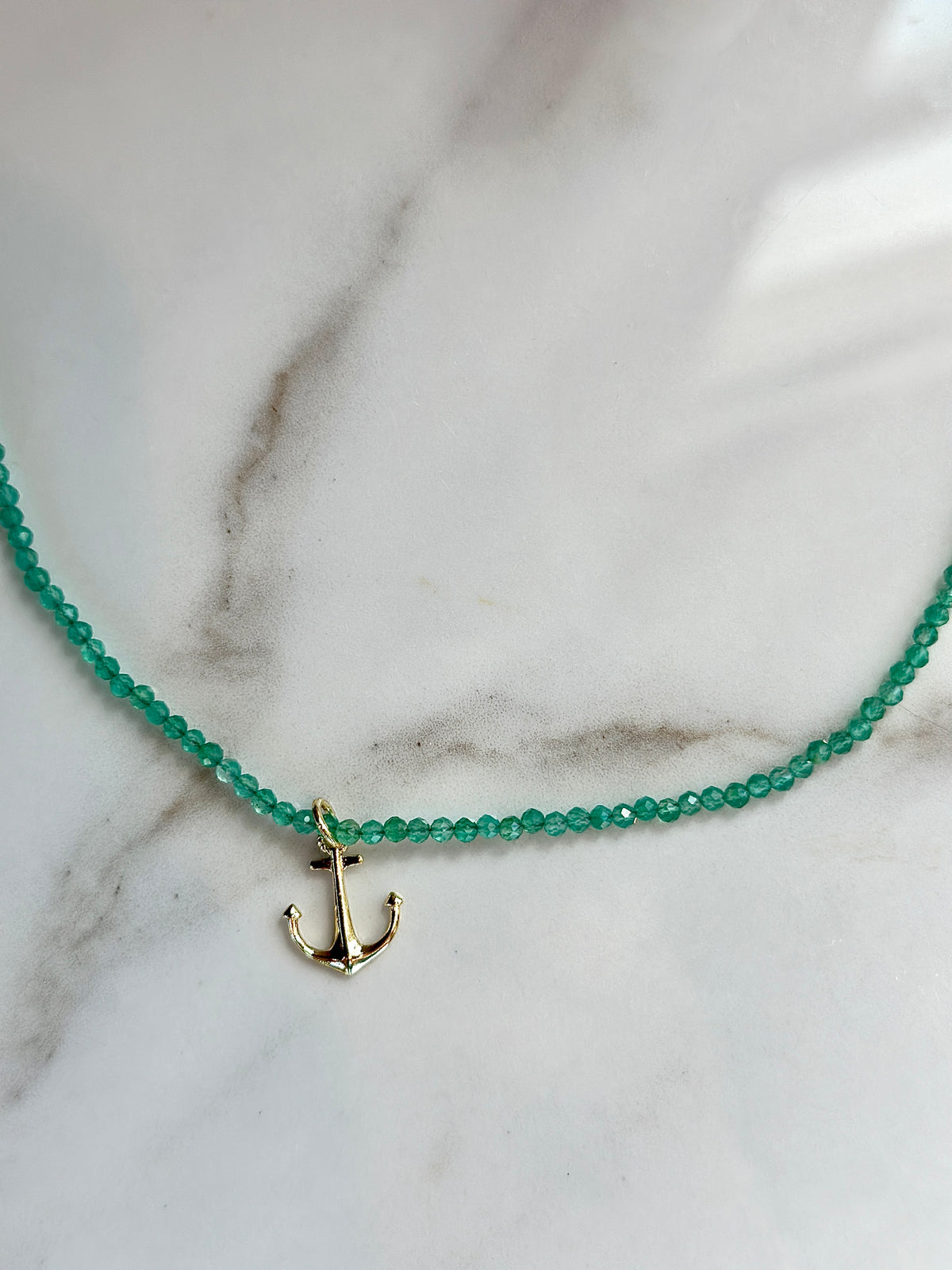 Bright green faceted Green Agate bead necklace with a petite gold anchor charm.