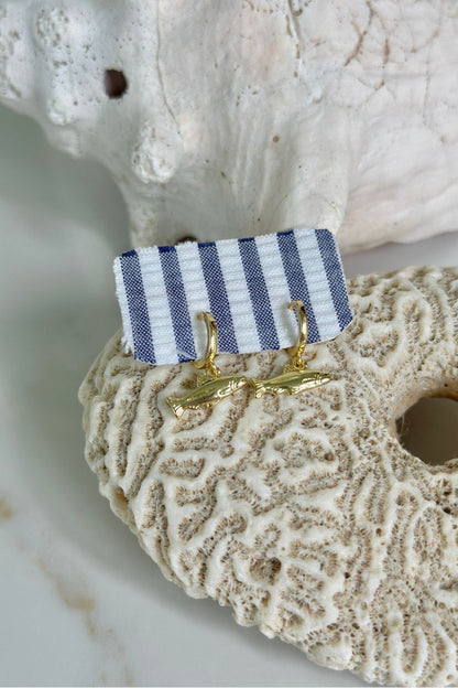 Maritt Row Gold Catch Hoops gold fish charm huggie earrings, coastal jewelry detail shot
