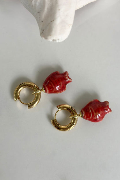 Harbor Red Hoops gold and red fish earrings, lifestyle flat lay