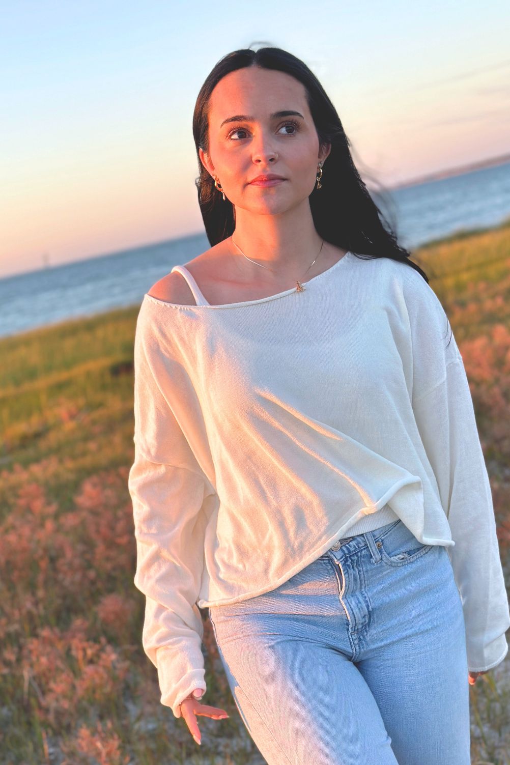 Lightweight layering sweater styled with jeans