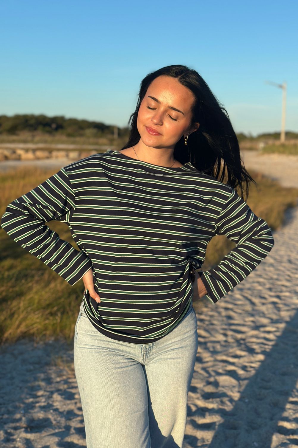 Casual boatneck striped shirt styled with jeans